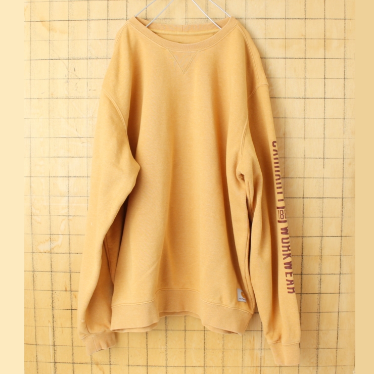 ビッグサイズ USA carhartt カーハート スウェット イエロー メンズL 袖プリント アメリカ古着