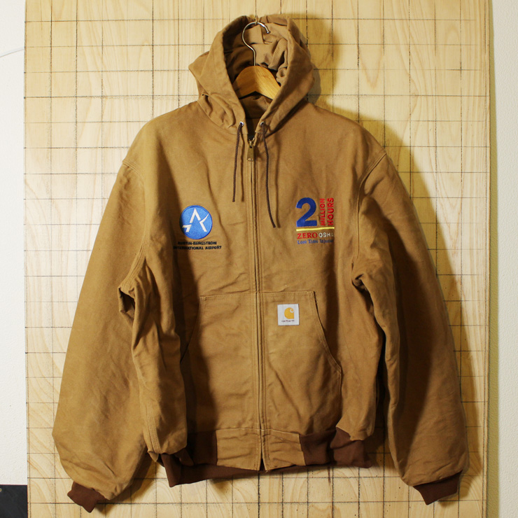 【carhartt】USA製古着ブラウン(茶)ダックAUSTIN-BERGSTROM INTERNATIONAL  AIRPORT裏地メッシュワークパーカージャケット・ブルゾン|メンズXL